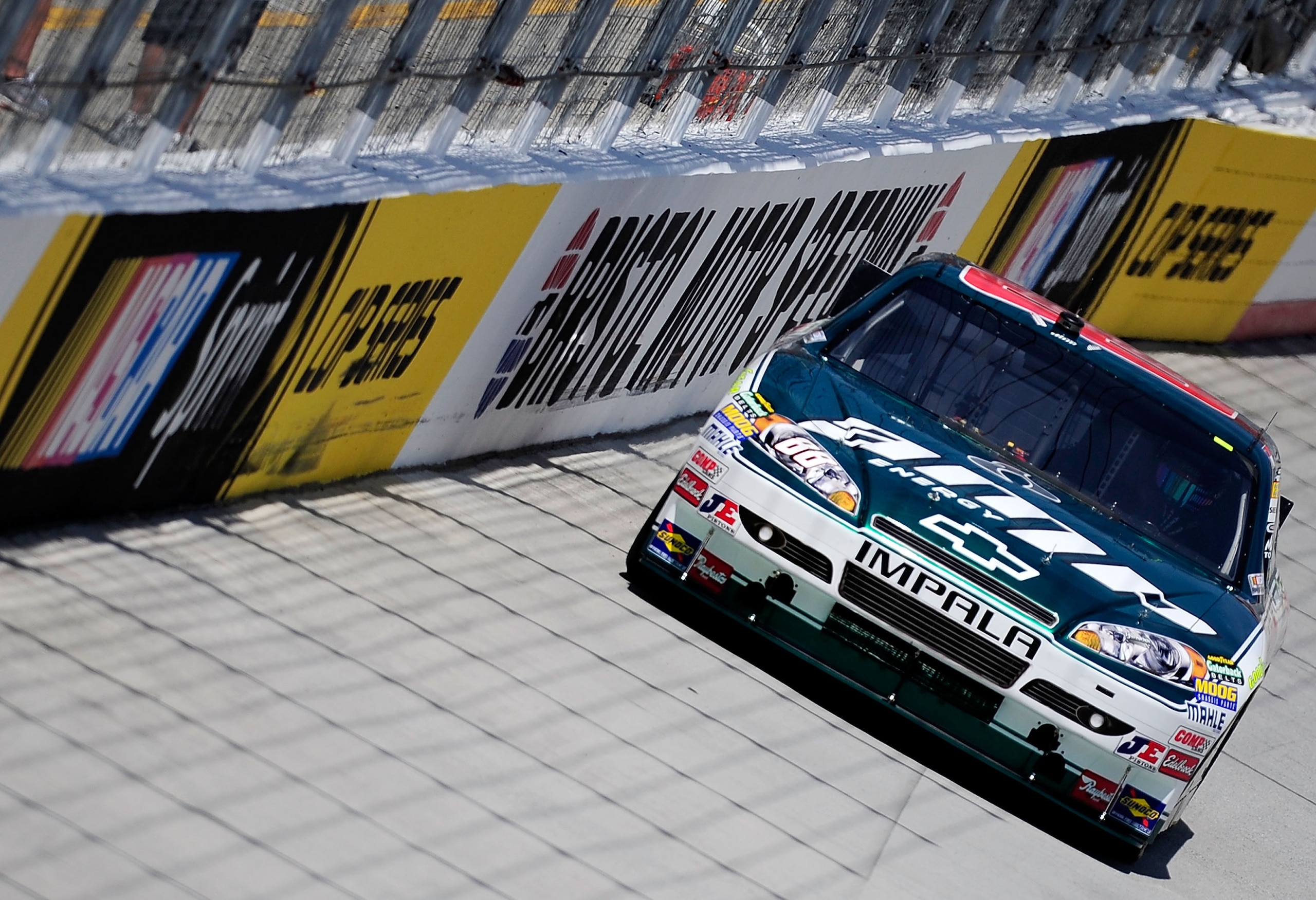BRISTOL, TN - AUGUST 20: Dale Earnhardt Jr. drives the #88 AMP Energy/National Guard Chevrolet during practice for the NASCAR Sprint Cup Series IRWIN Tools Night Race at Bristol Motor Speedway on August 20, 2010 in Bristol, Tennessee. (Photo by Rusty Ja BRISTOL, TN - AUGUST 20: Dale Earnhardt Jr. drives the #88 AMP Energy/National Guard Chevrolet during practice for the NASCAR Sprint Cup Series IRWIN Tools Night Race at Bristol Motor Speedway on August 20, 2010 in Bristol, Tennessee. (Photo by Rusty Ja