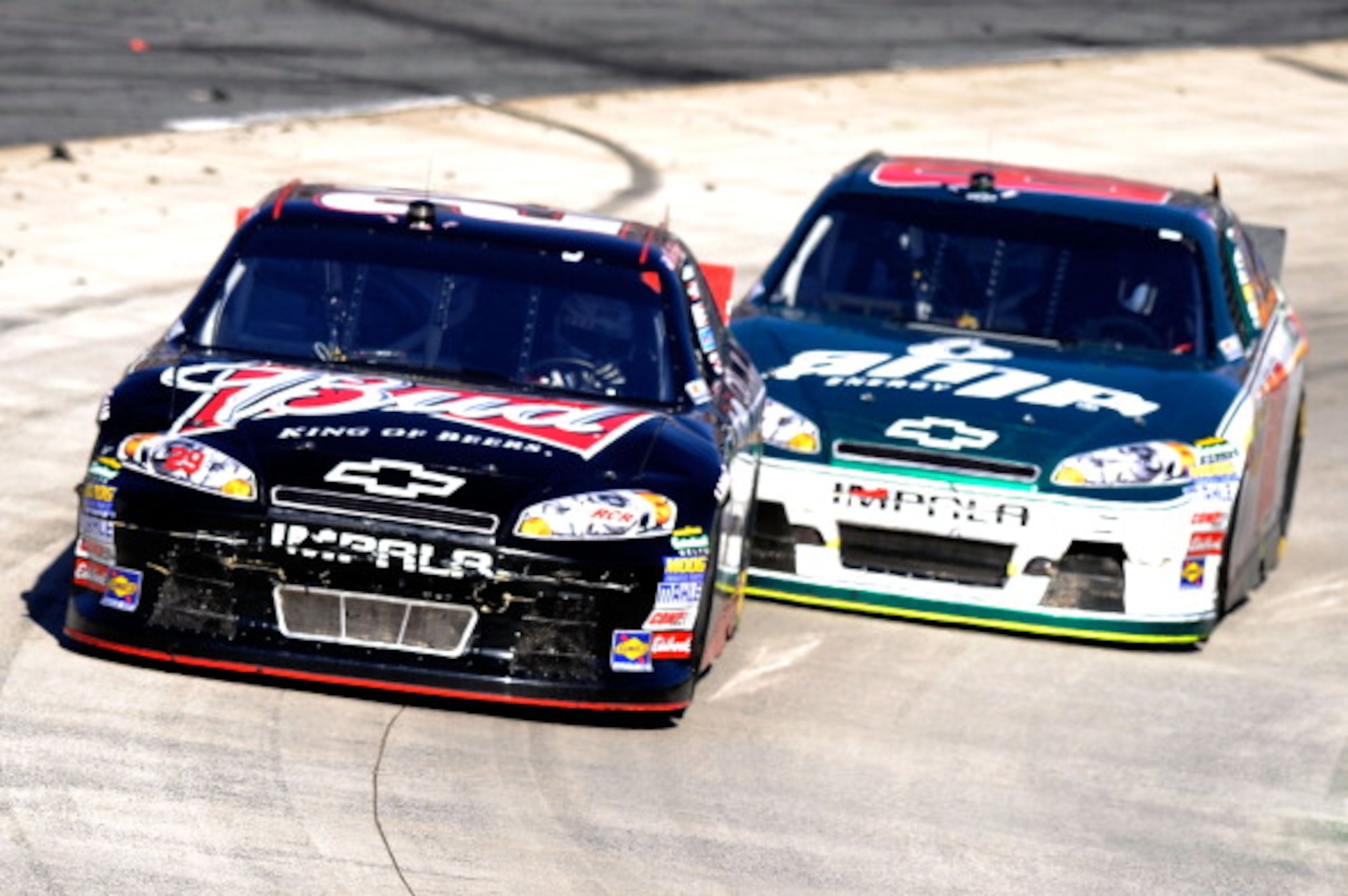 MARTINSVILLE, VA - APRIL 03: Kevin Harvick, driver of the #29 Budweiser Chevrolet, leads Dale Earnhardt Jr., driver of the #88 Amp Energy/National Guard Chevrolet, during the NASCAR Sprint Cup Series Goody's Fast Relief 500 at Martinsville Speedway on Ap MARTINSVILLE, VA - APRIL 03: Kevin Harvick, driver of the #29 Budweiser Chevrolet, leads Dale Earnhardt Jr., driver of the #88 Amp Energy/National Guard Chevrolet, during the NASCAR Sprint Cup Series Goody's Fast Relief 500 at Martinsville Speedway on Ap