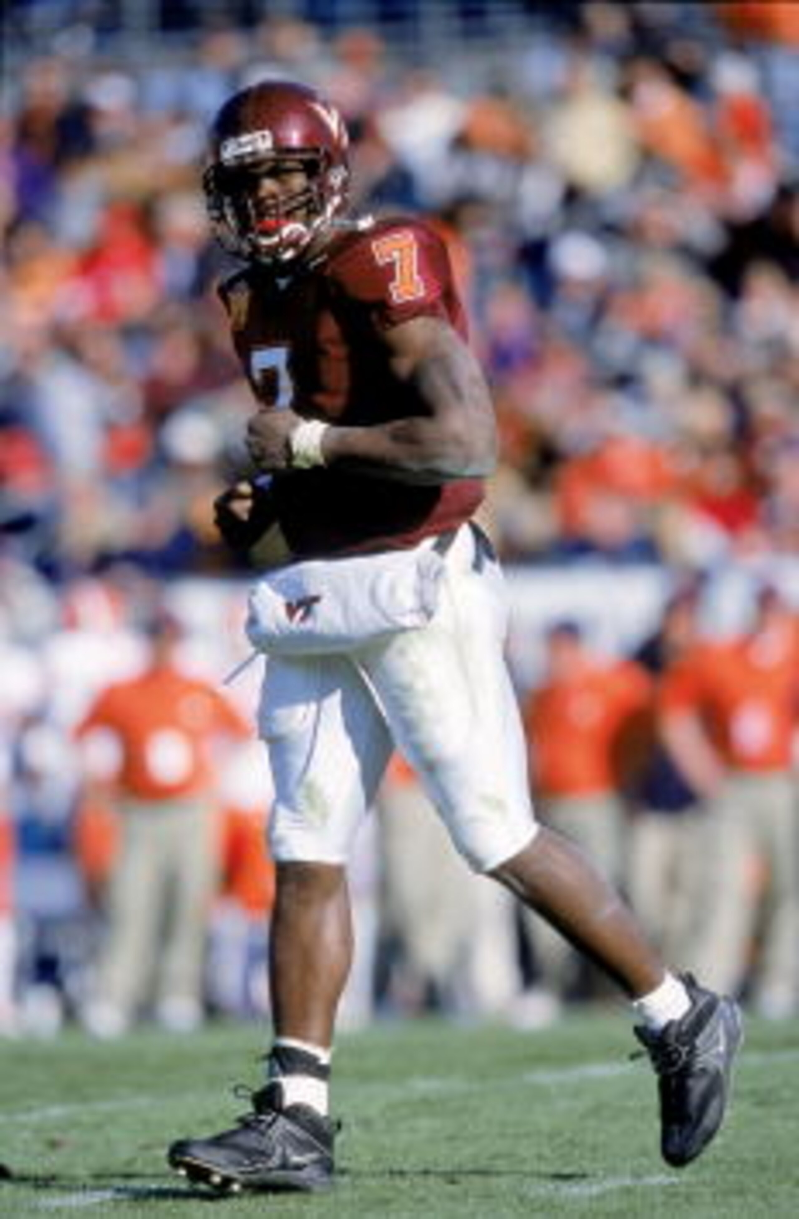 1 Jan 2001:  Quaterback Michael Vick #7of the Virginia Tech Hokies jogs on the field during the Gator Bowl Game against the Clemson Tigers at the Gator Bowl in Jacksonville, Florida.  The Hokies defeated the Tigers 41-20.Mandatory Credit: Craig Jones  /Al