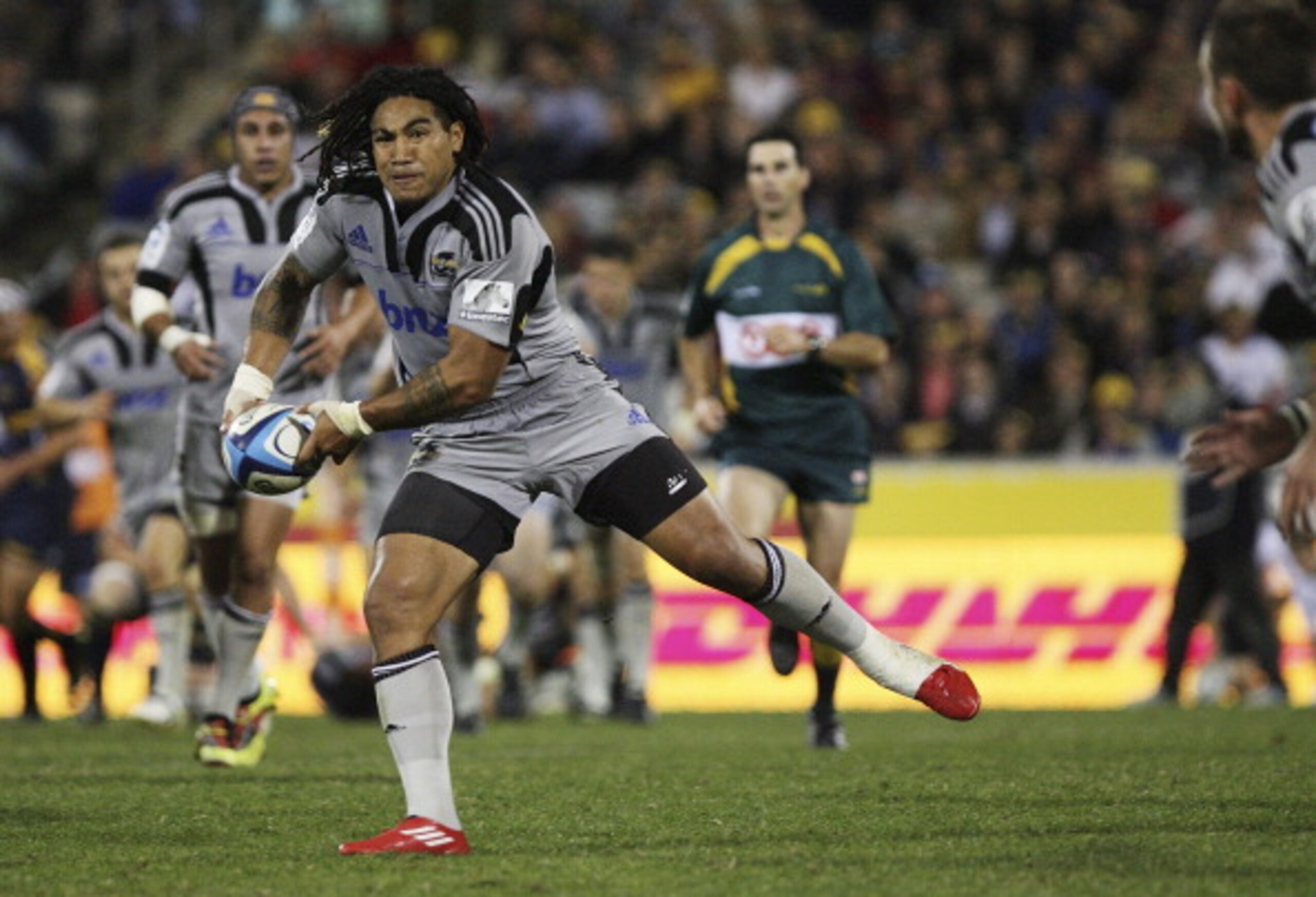 CANBERRA, AUSTRALIA - APRIL 09:  Ma'a Nonu of the Hurricanes passes the ball during the round eight Super Rugby match between the Brumbies and the Hurricanes at Canberra Stadium on April 9, 2011 in Canberra, Australia.  (Photo by Stefan Postles/Getty Imag