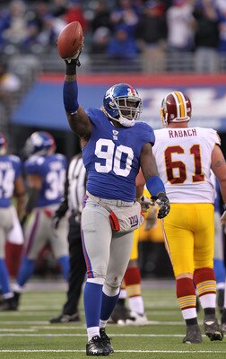 EAST RUTHERFORD, NJ - DECEMBER 05: Jason Pierre-Paul #90 of the New York Giants celebrates running back a fumble by the Washington Redskins during their game on December 5, 2010 at The New Meadowlands Stadium in East Rutherford, New Jersey. (Photo by Al EAST RUTHERFORD, NJ - DECEMBER 05: Jason Pierre-Paul #90 of the New York Giants celebrates running back a fumble by the Washington Redskins during their game on December 5, 2010 at The New Meadowlands Stadium in East Rutherford, New Jersey. (Photo by Al