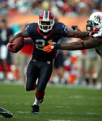 MIAMI - DECEMBER 19: Running Back C.J. Spiller #21 of the Buffalo Bills runs against the Miami Dolphins at Sun Life Stadium on December 19, 2010 in Miami, Florida.The Bills defeated the Dolphins 17-14. (Photo by Marc Serota/Getty Images) MIAMI - DECEMBER 19: Running Back C.J. Spiller #21 of the Buffalo Bills runs against the Miami Dolphins at Sun Life Stadium on December 19, 2010 in Miami, Florida.The Bills defeated the Dolphins 17-14. (Photo by Marc Serota/Getty Images)