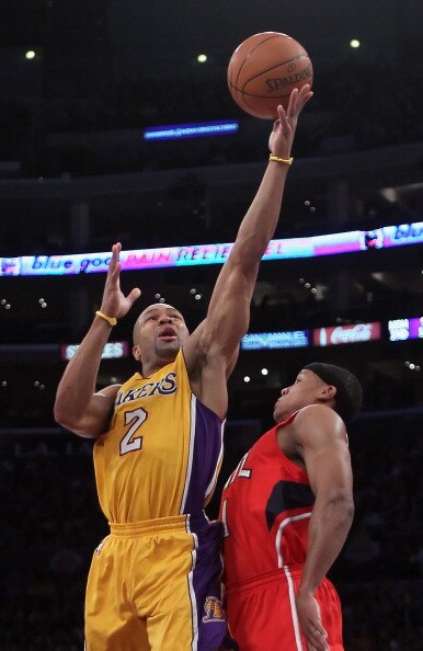 LOS ANGELES, CA - FEBRUARY 22:  Derek Fisher #2 of the Los Angeles Lakers shoots over Maurice Evans #1 of the Atlanta Hawks in the first half at Staples Center on February 22, 2011 in Los Angeles, California. NOTE TO USER: User expressly acknowledges and