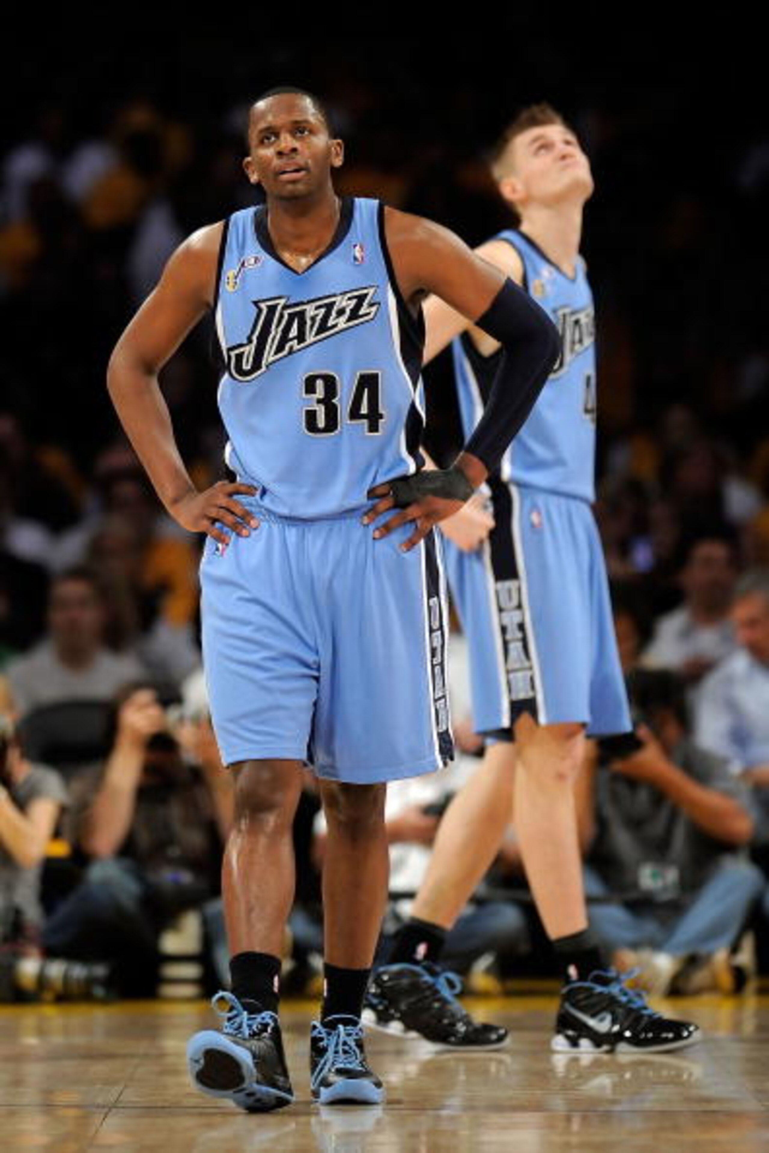 LOS ANGELES, CA - APRIL 19: (L-R) C.J. Miles #34 and Andrei Kirilenko #47 of the Utah Jazz react in the second quarter against the Los Angeles Lakers in Game One of the Western Conference Quarterfinals during the 2009 NBA Playoffs at Staples Center on Ap LOS ANGELES, CA - APRIL 19: (L-R) C.J. Miles #34 and Andrei Kirilenko #47 of the Utah Jazz react in the second quarter against the Los Angeles Lakers in Game One of the Western Conference Quarterfinals during the 2009 NBA Playoffs at Staples Center on Ap