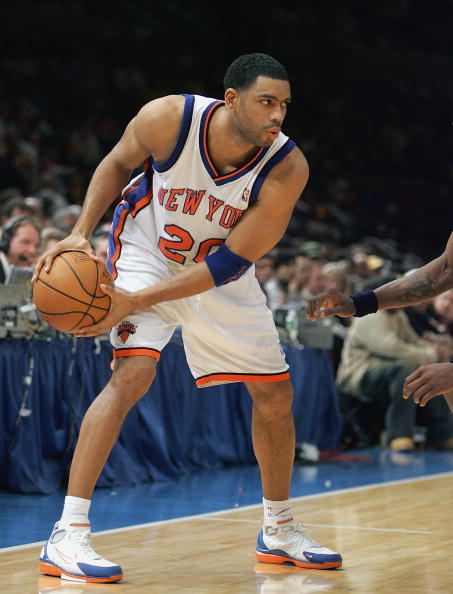 NEW YORK - DECEMBER 21:  Allan Houston #20 of the New York Knicks holds the ball against the Dallas Mavericks on December 21, 2004 at Madison Square Garden in New York City.  The Mavs won 123-94. NOTE TO USER: User expressly acknowledges and agrees that,