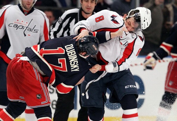 NEW YORK, NY - DECEMBER 12:  Alex Ovechkin #8 of the Washington Capitals trades punches during the second period against Brandon Dubinsky #17 of the New York Rangers on December 12, 2010 at Madison Square Garden in New York City.  (Photo by Jim McIsaac/Ge