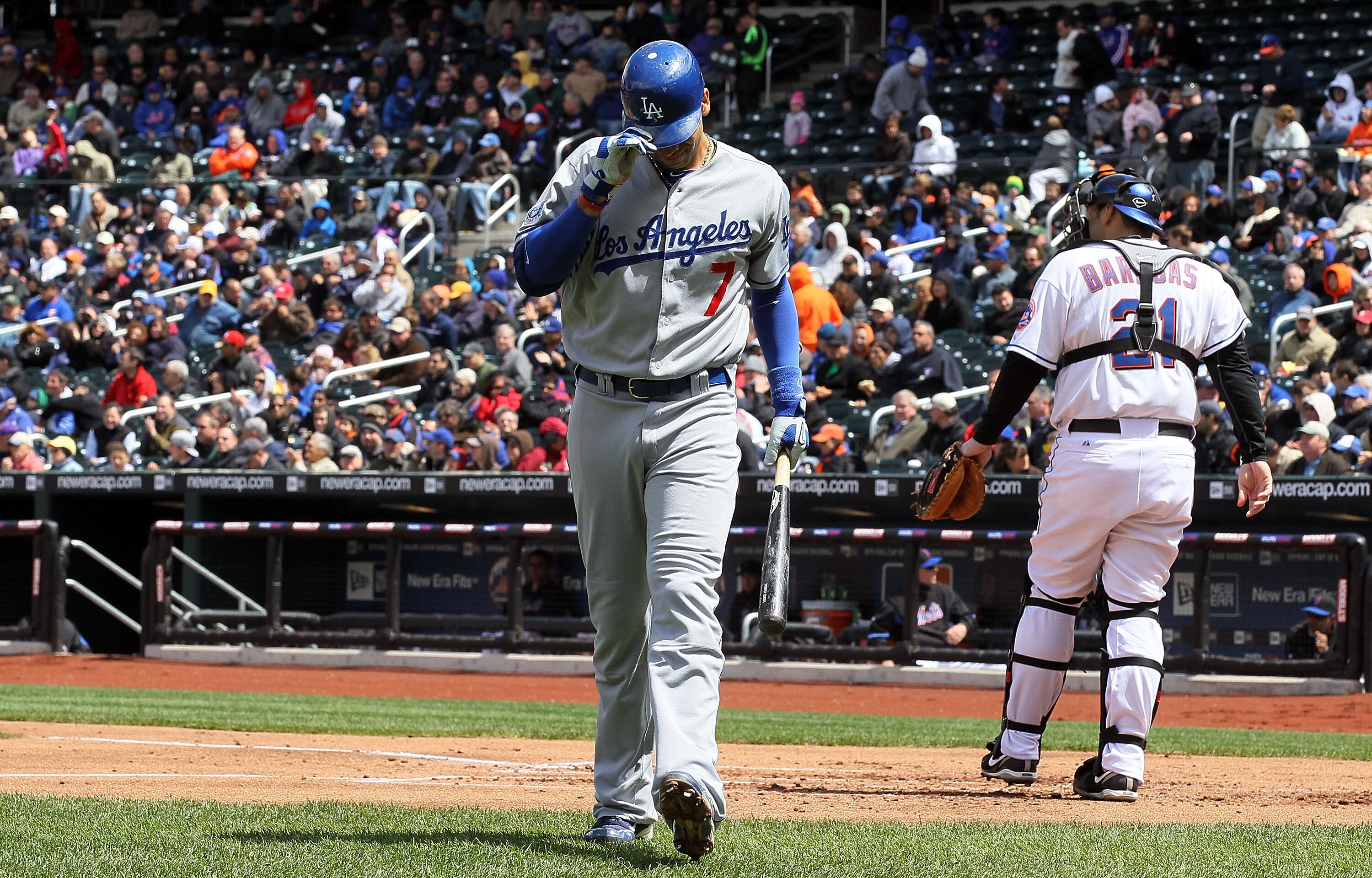 NEW YORK - APRIL 28:  James Loney #7 of the Los Angeles Dodgers walks back to the dugout after striking out in the second inning against the New York Mets on April 28, 2010 at Citi Field in the Flushing neighborhood of the Queens borough of New York City.