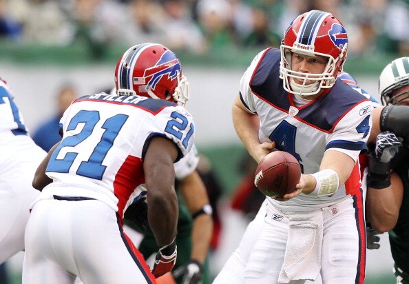 EAST RUTHERFORD, NJ - JANUARY 02:  Brian Brohm #4 and C.J. Spiller #21 of the Buffalo Bills run a play against the New York Jets at New Meadowlands Stadium on January 2, 2011 in East Rutherford, New Jersey.  (Photo by Al Bello/Getty Images)