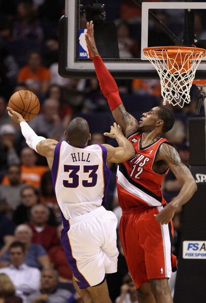 PHOENIX - DECEMBER 10: LaMarcus Aldridge #12 of the Portland Trail Blazers defends against Grant Hill #33 of the Phoenix Suns during the NBA game at US Airways Center on December 10, 2010 in Phoenix, Arizona. The Trail Blazers defeated the Suns 101-94. PHOENIX - DECEMBER 10: LaMarcus Aldridge #12 of the Portland Trail Blazers defends against Grant Hill #33 of the Phoenix Suns during the NBA game at US Airways Center on December 10, 2010 in Phoenix, Arizona. The Trail Blazers defeated the Suns 101-94.