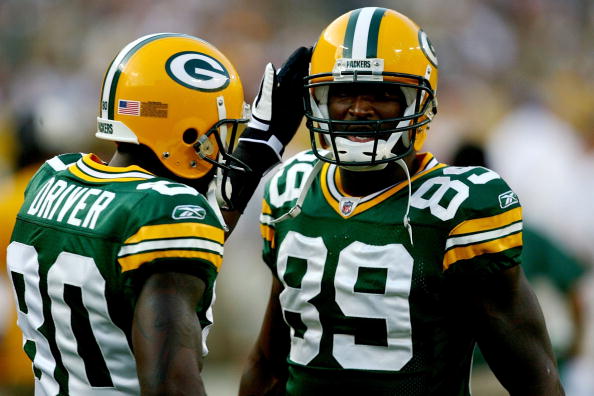 GREEN BAY, WI - AUGUST 15:  (R-L) Wide receiver James Jones #89 of the Green Bay Packers talks with Donald Driver #80 before taking on the Cleveland Browns during the preseason game at Lambeau Field on August 15, 2009 in Green Bay, Wisconsin.  (Photo by J