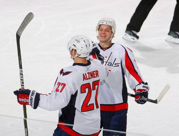 BUFFALO, NY - NOVEMBER 13: Karl Alzner #27 and John Carlson #74 of the Washington Capitals celebrate Alzner's goal in the first period against the Buffalo Sabres  at HSBC Arena on November 13, 2010 in Buffalo, New York.  (Photo by Rick Stewart/Getty Image