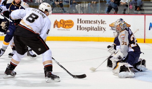 NASHVILLE, TN - MARCH 24:   Pekka Rinne #35 of the Nashville Predators makes a save on Teemu Selanne #8 of the Anaheim Ducks on March 24, 2011 at the Bridgestone Arena in Nashville, Tennessee.  (Photo by Frederick Breedon/Getty Images)