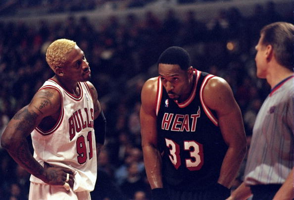 10 Mar 1998:  Center Alonzo Mourning of the Miami Heat (center) stands with forward Dennis Rodman of the Chicago Bulls (left) and referee Steve Javie during a game at the United Center in Chicago, Illinois.  The Bulls defeated the Heat 106-91. Mandatory C