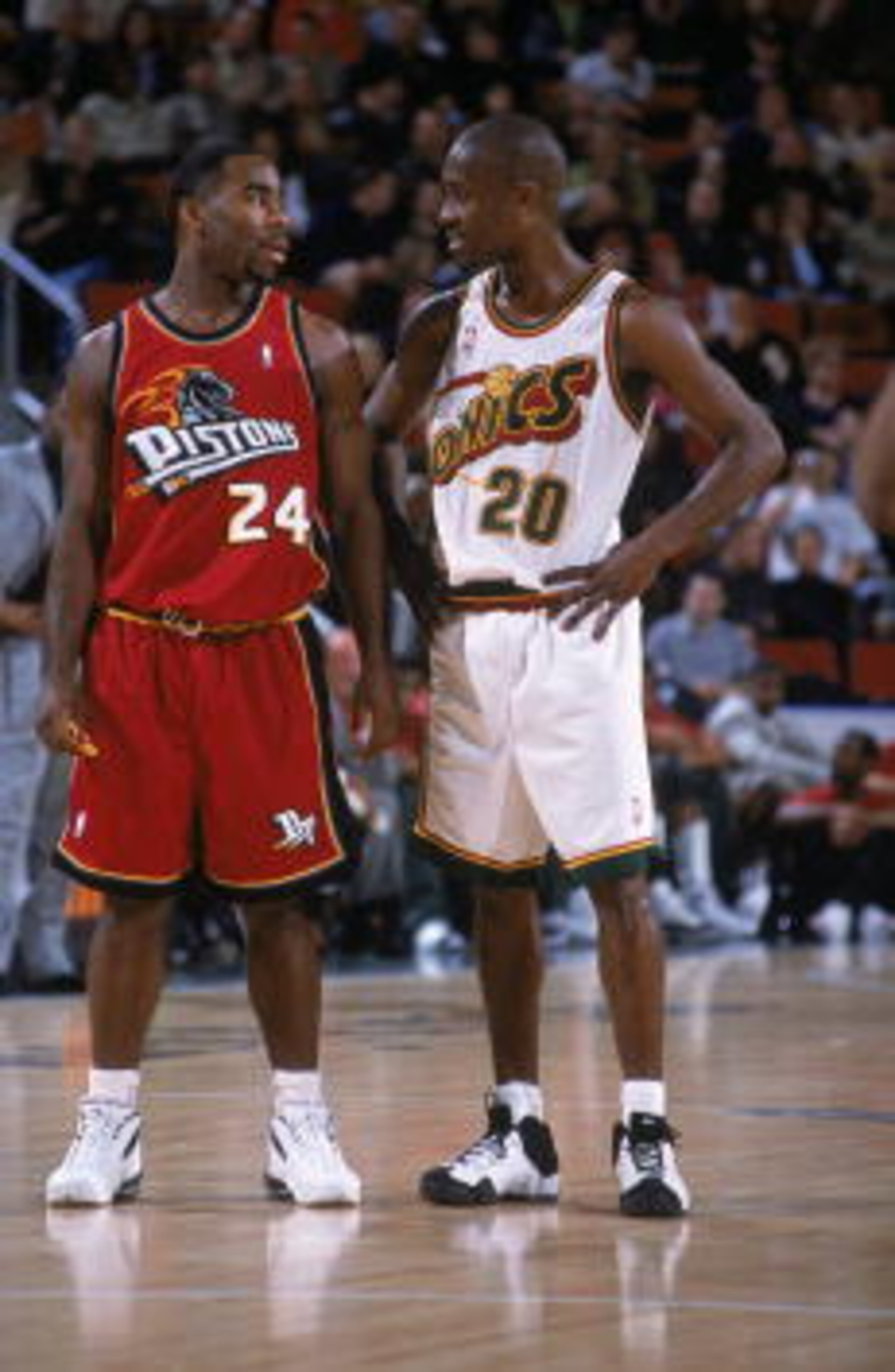 6 Dec 2000:  Gary Payton #20 of the Detroit Pistons talks with Mateen Cleaves #24 of the Seattle SuperSonics on the court during the game at Key Arena in Seattle, Washington. The Pistons defeated the SuperSonics 112-99.    NOTE TO USER: It is expressly un