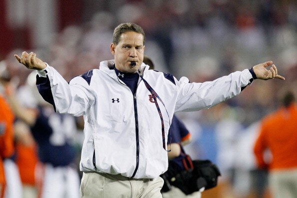 GLENDALE, AZ - JANUARY 10:  Head coach Gene Chizik of the Auburn Tigers reacts on the sideline against the Oregon Ducks during the Tostitos BCS National Championship Game at University of Phoenix Stadium on January 10, 2011 in Glendale, Arizona.  (Photo b