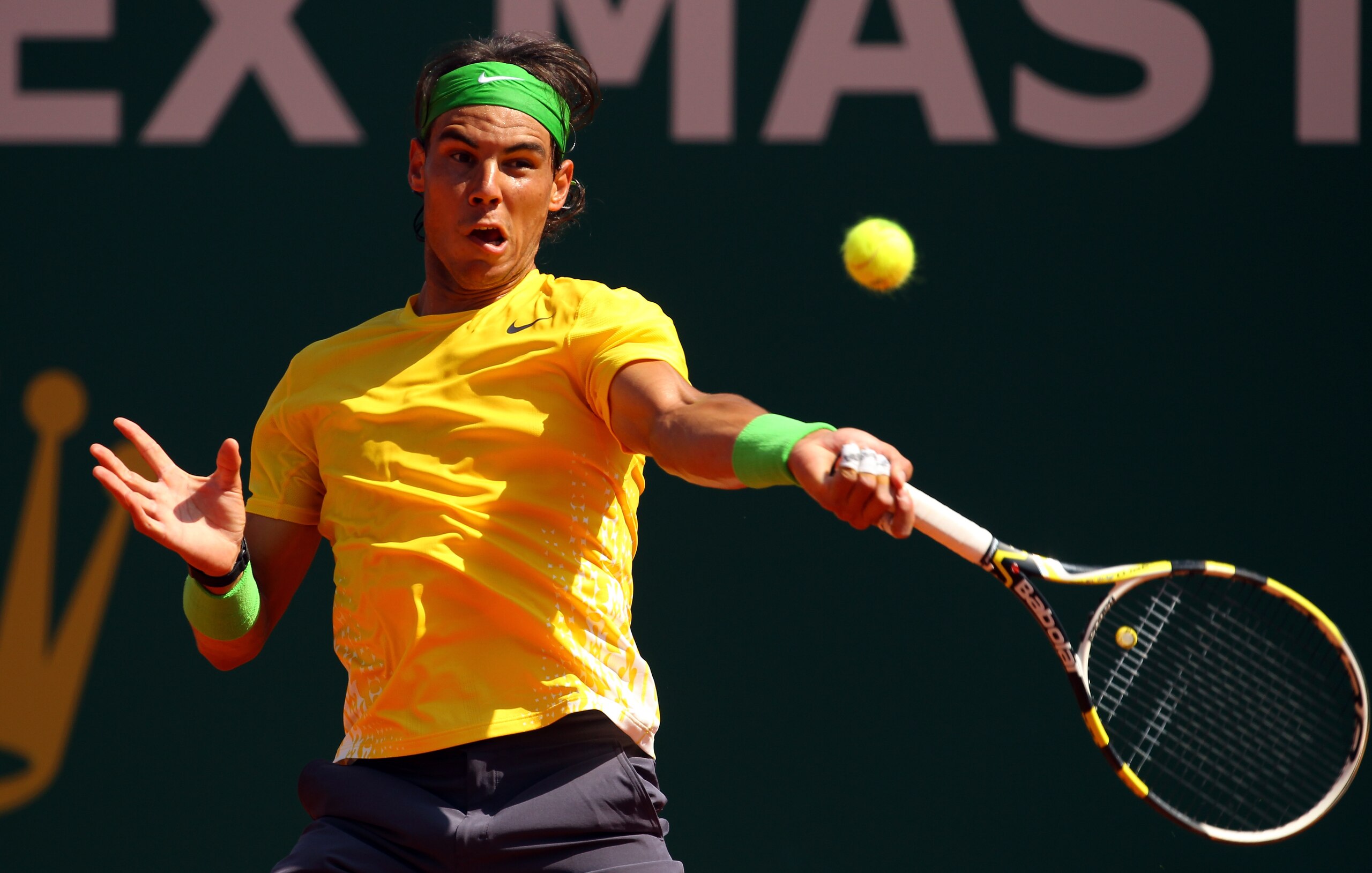 MONACO - APRIL 13:  Rafael Nadal of Spain plays a forehand in his match against Jarkko Nieminen of Finland during Day Four of the ATP Masters Series Tennis at the Monte Carlo Country Club on April 13, 2011 in Monte Carlo, Monaco.  (Photo by Julian Finney/