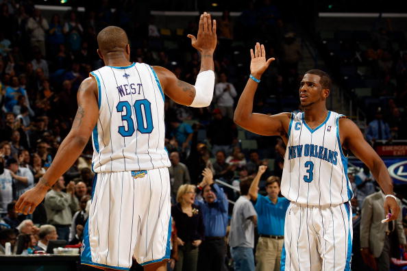 NEW ORLEANS - DECEMBER 16:  Chris Paul #3 and David West #30 of the New Orleans Hornets celebrate during the game against the Detroit Pistons at New Orleans Arena on December 16, 2009 in New Orleans, Louisiana. The Hornets defeated the Pistons 95-87. NOTE