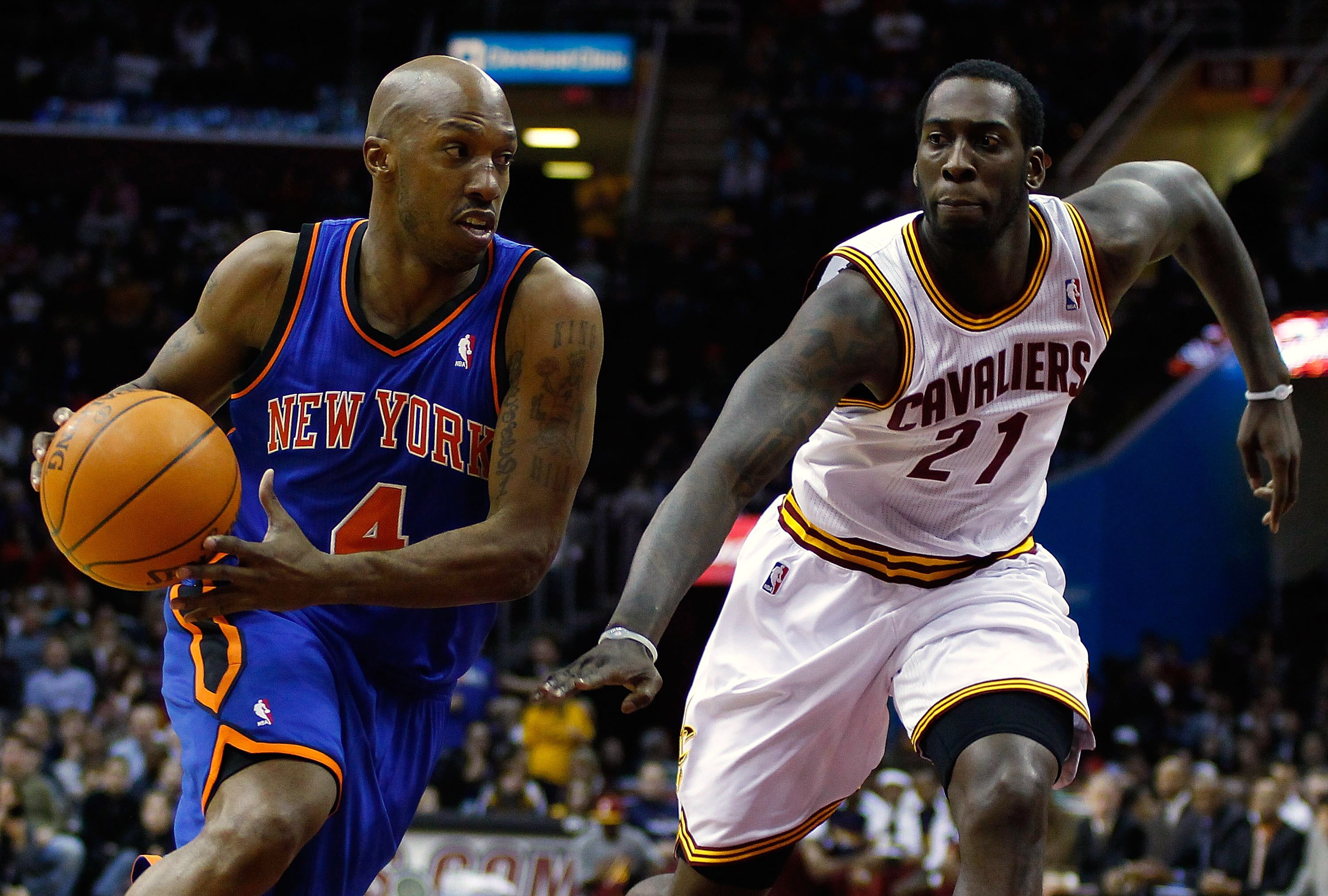 CLEVELAND - FEBRUARY 25:  Chauncey Billups #4 of the New York Knicks attempts to drive around J.J. Hickson #21 of the Cleveland Cavaliers during the game on February 25, 2011 at Quicken Loans Arena in Cleveland, Ohio. NOTE TO USER: User expressly acknowle