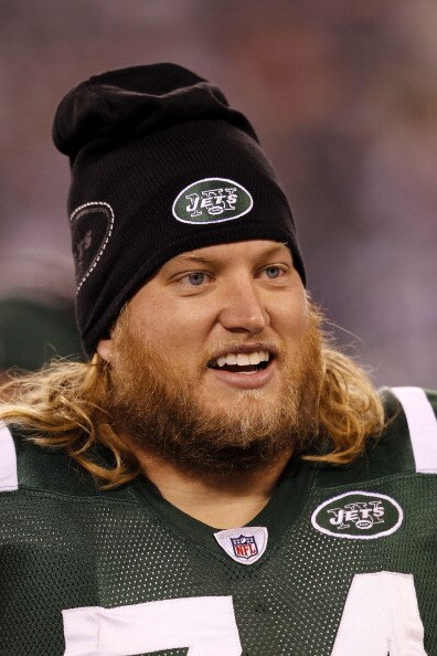 EAST RUTHERFORD, NJ - NOVEMBER 25: Nick Mangold #74 of the New York Jets stands on the sideline during the game against the Cincinnati Bengals at New Meadowlands Stadium on November 25, 2010 in East Rutherford, New Jersey. The Jets defeated the Bengal 26-