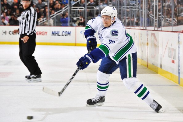 PITTSBURGH - NOVEMBER 17:  Alexander Edler #23 of the Vancouver Canucks skates with the puck against the Pittsburgh Penguins on November 17, 2010 at Consol Energy Center in Pittsburgh, Pennsylvania.  (Photo by Jamie Sabau/Getty Images)