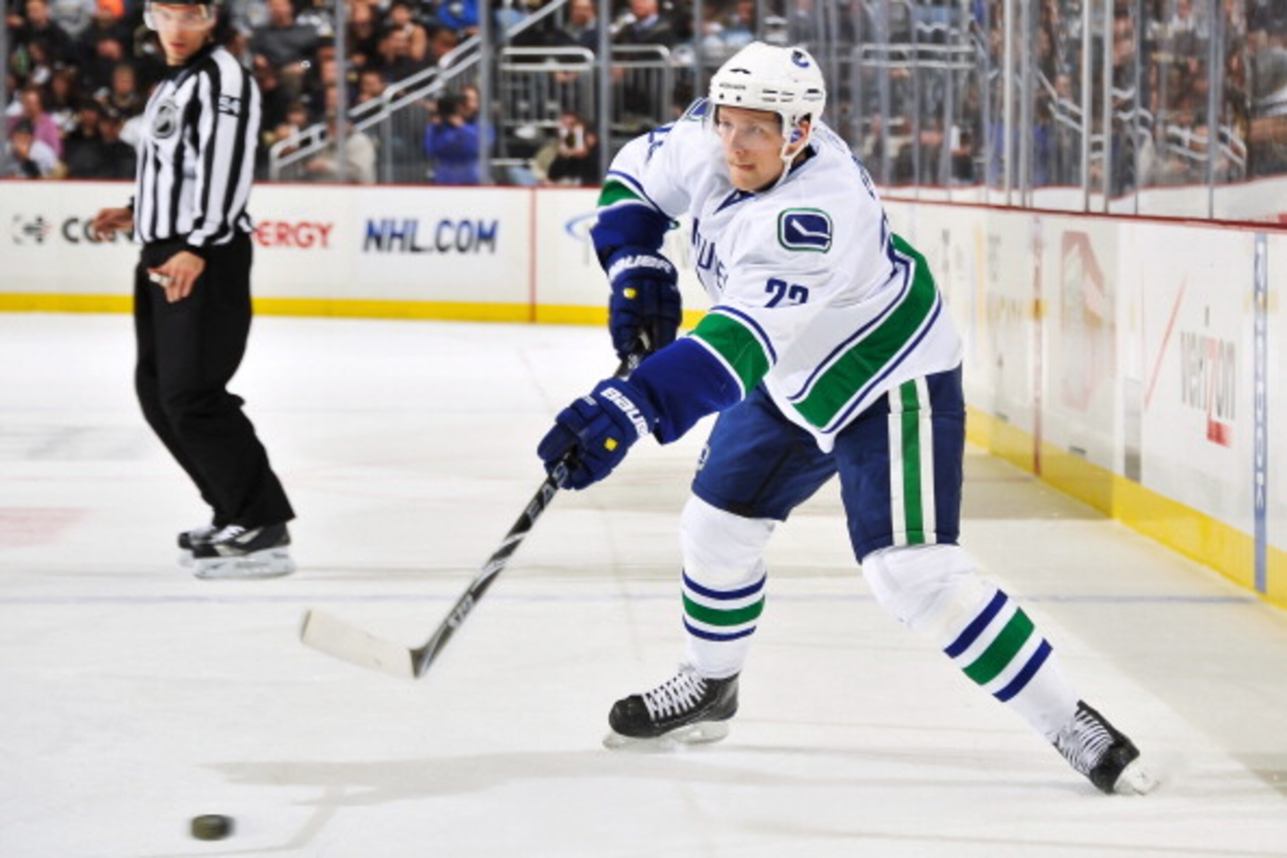 PITTSBURGH - NOVEMBER 17:  Alexander Edler #23 of the Vancouver Canucks skates with the puck against the Pittsburgh Penguins on November 17, 2010 at Consol Energy Center in Pittsburgh, Pennsylvania.  (Photo by Jamie Sabau/Getty Images)