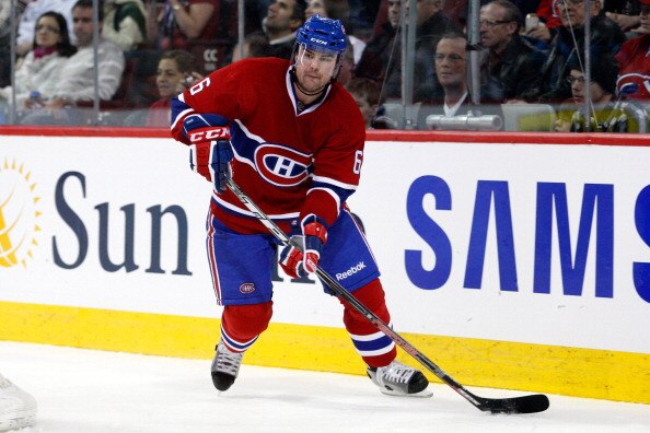 MONTREAL, CANADA - JANUARY 2:  Jaroslav Spacek #6 of the Montreal Canadiens skates with the puck during the NHL game against the Atlanta Thrashers at the Bell Centre on January 2, 2011 in Montreal, Quebec, Canada.  The Thrashers defeated the Canadiens 4-3