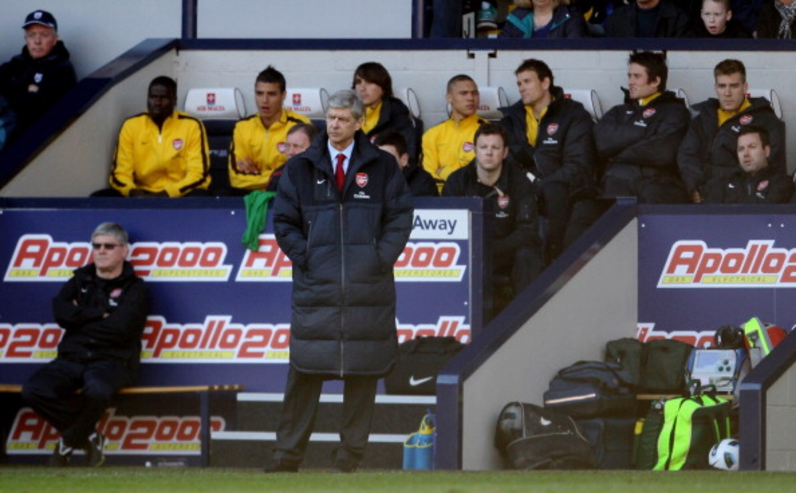 WEST BROMWICH, ENGLAND - MARCH 19: Arsene Wenger manager of Arsenal looks on from the away dugout during the Barclays Premier League match between West Bromwich Albion and Arsenal at The Hawthorns on March 19, 2011 in West Bromwich, England.  (Photo by Sc
