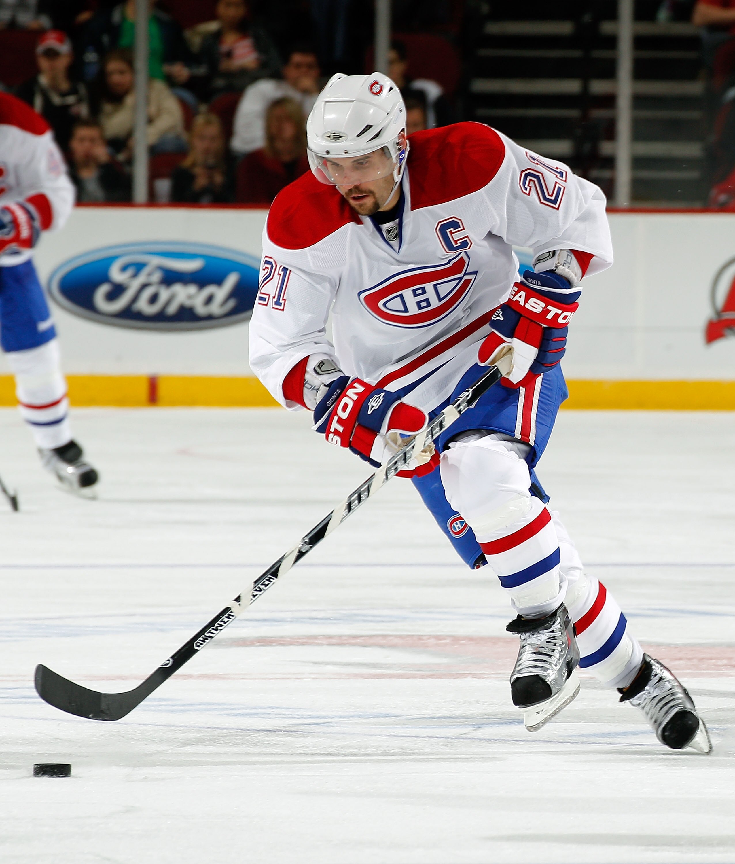 NEWARK, NJ - APRIL 02:  Brian Gionta #21 of the Montreal Canadians skates during an NHL hockey game against the New Jersey Devils at the Prudential Center on April 2, 2011 in Newark, New Jersey.  (Photo by Paul Bereswill/Getty Images)