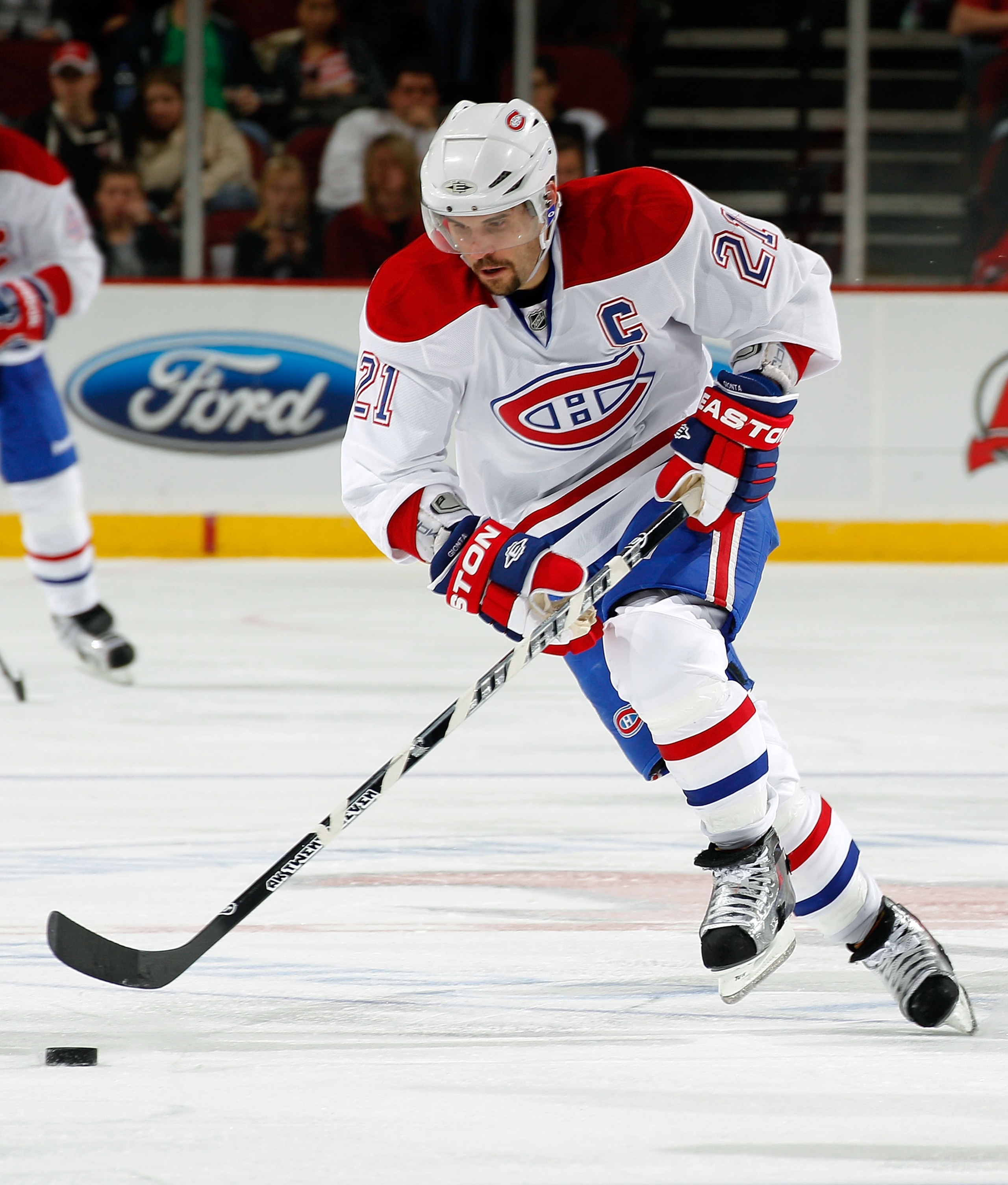 NEWARK, NJ - APRIL 02:  Brian Gionta #21 of the Montreal Canadians skates during an NHL hockey game against the New Jersey Devils at the Prudential Center on April 2, 2011 in Newark, New Jersey.  (Photo by Paul Bereswill/Getty Images)