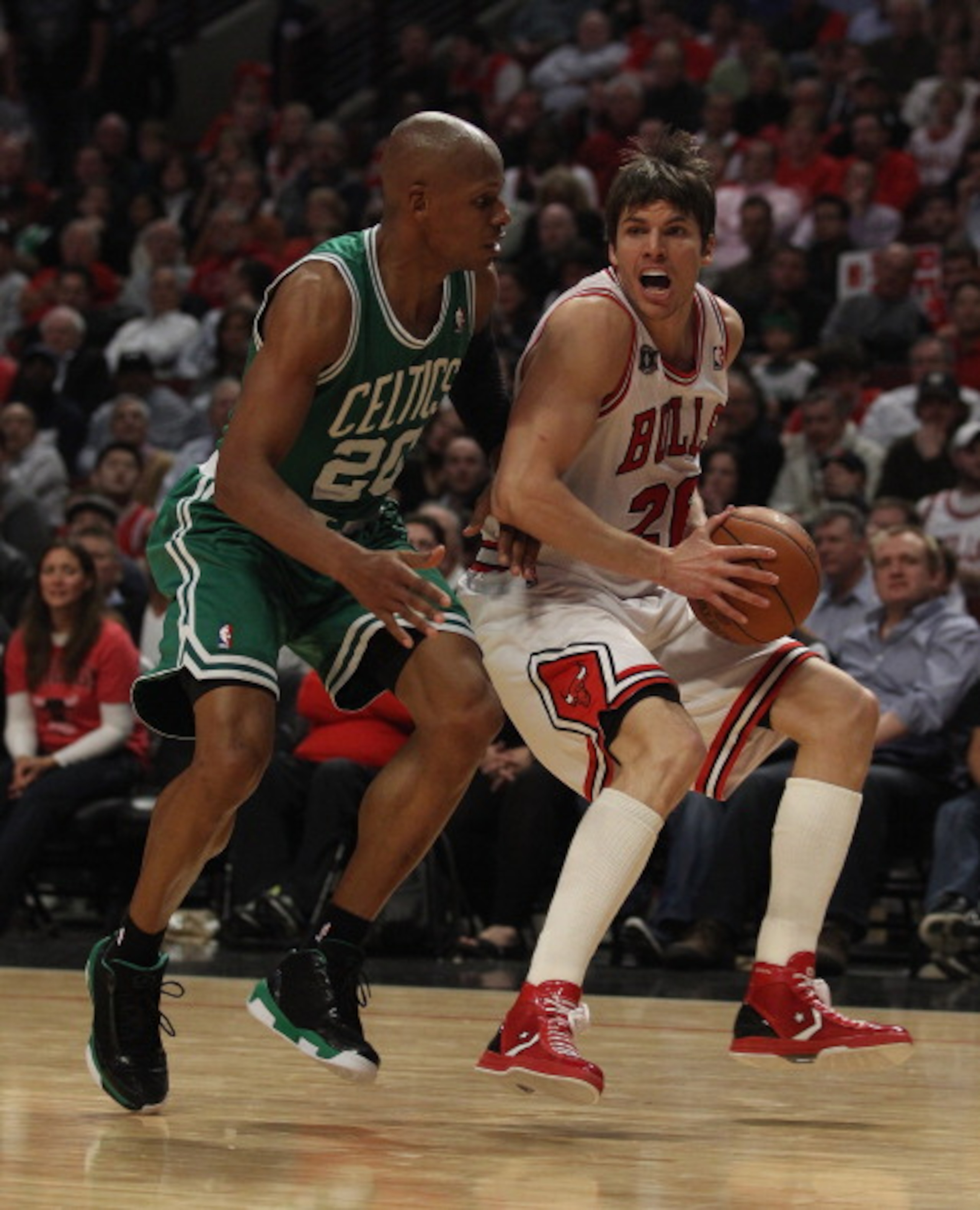 CHICAGO, IL - APRIL 07: Kyle Korver #26 of the Chicago Bulls drives against Ray Allen #20 of the Boston Celtics at United Center on April 7, 2011 in Chicago, Illinois. The Bulls defeated the Celtics 97-81. NOTE TO USER: User expressly acknowledges and agr CHICAGO, IL - APRIL 07: Kyle Korver #26 of the Chicago Bulls drives against Ray Allen #20 of the Boston Celtics at United Center on April 7, 2011 in Chicago, Illinois. The Bulls defeated the Celtics 97-81. NOTE TO USER: User expressly acknowledges and agr
