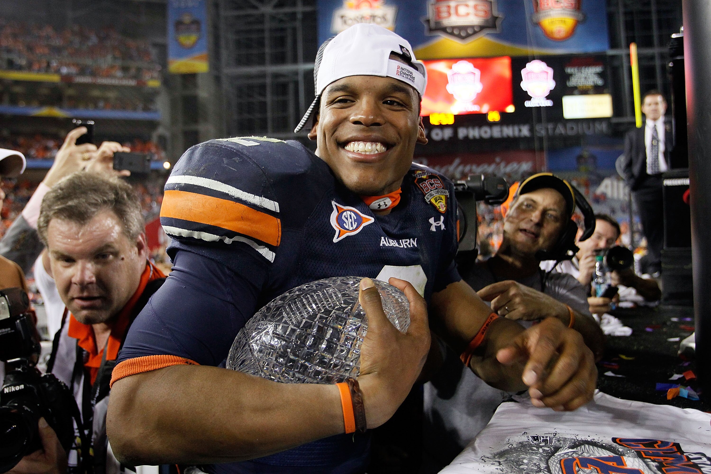 GLENDALE, AZ - JANUARY 10:  Quarterback Cameron Newton #2 of the Auburn Tigers celebrates the Tigers 22-19 victory against the Oregon Ducks in the Tostitos BCS National Championship Game at University of Phoenix Stadium on January 10, 2011 in Glendale, Ar