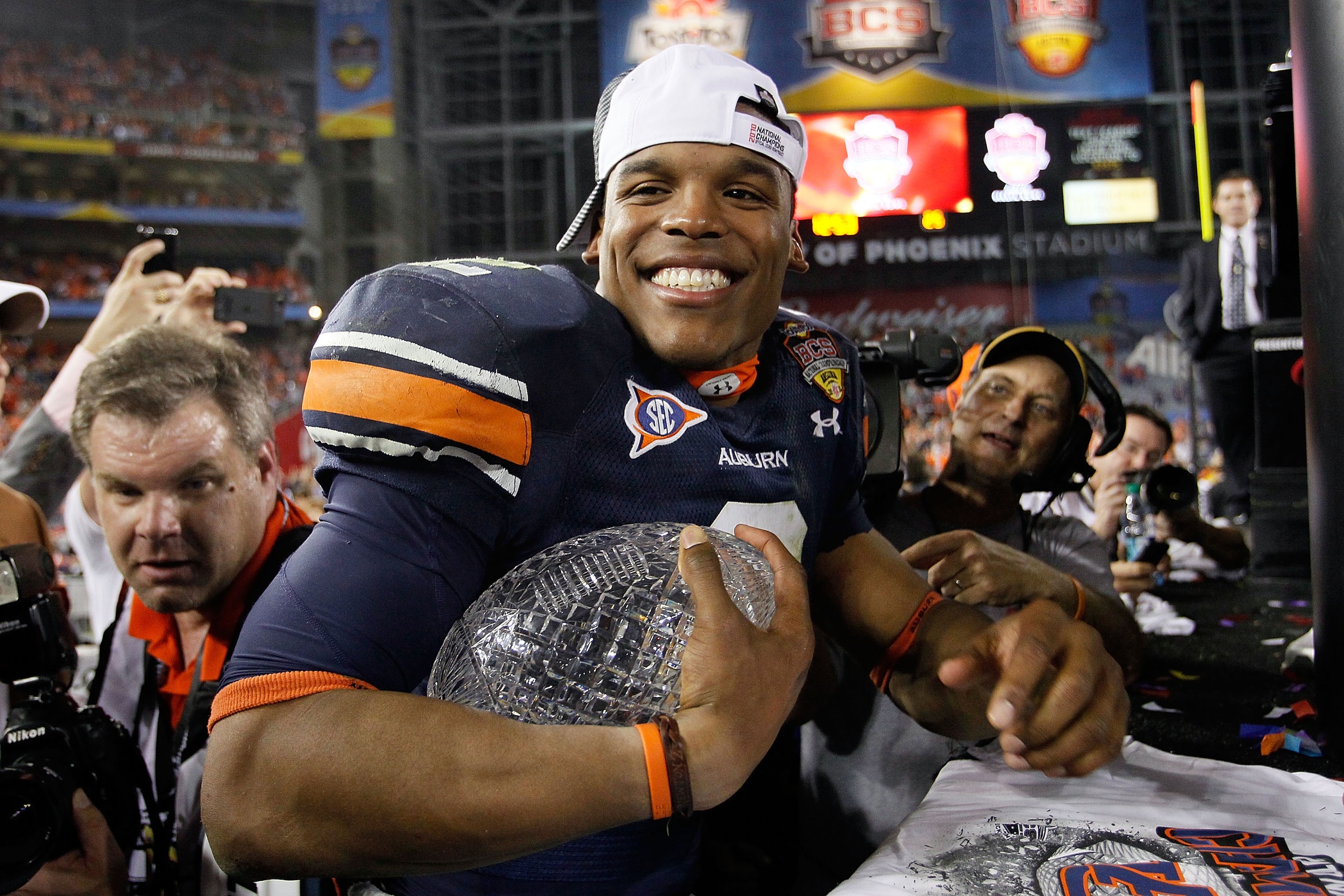 GLENDALE, AZ - JANUARY 10:  Quarterback Cameron Newton #2 of the Auburn Tigers celebrates the Tigers 22-19 victory against the Oregon Ducks in the Tostitos BCS National Championship Game at University of Phoenix Stadium on January 10, 2011 in Glendale, Ar