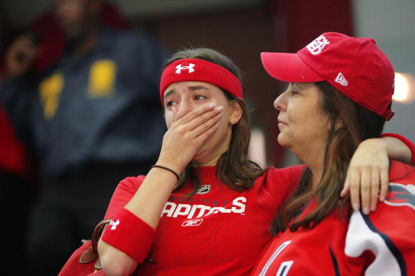 WASHINGTON - APRIL 22:  A disappointed fan of the Washington Capitals comes to tears with a overtime loss against the Philadelphia Flyers during game seven of the Eastern Conference Quarterfinals of the 2008 NHL Stanley Cup Playoffs on April 22, 2008 at t