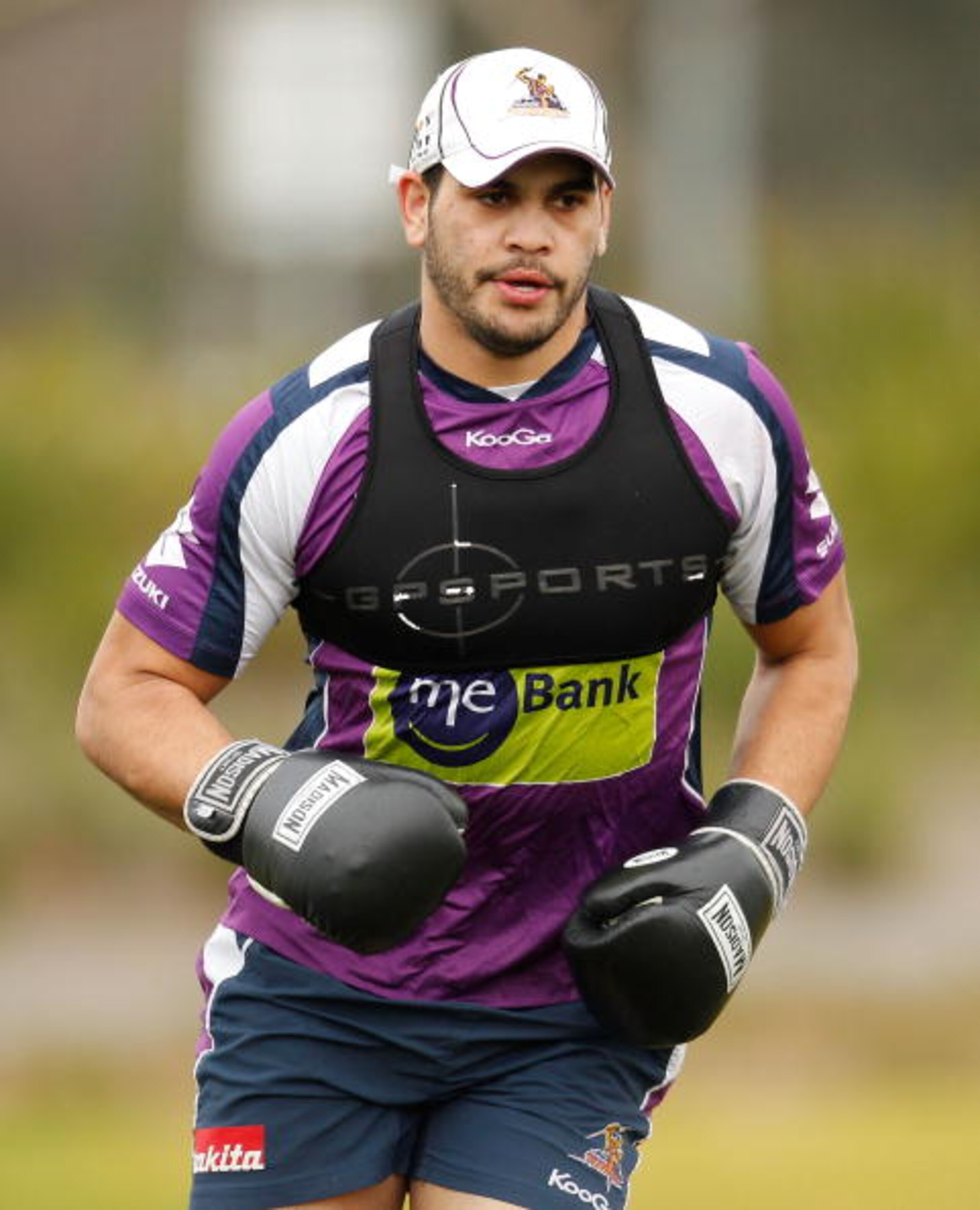 MELBOURNE, AUSTRALIA - JULY 20:  Greg Inglis of the Storm wears boxing gloves during a Melbourne Storm NRL training session at Gosch's Paddock on July 20, 2010 in Melbourne, Australia.  (Photo by Scott Barbour/Getty Images)