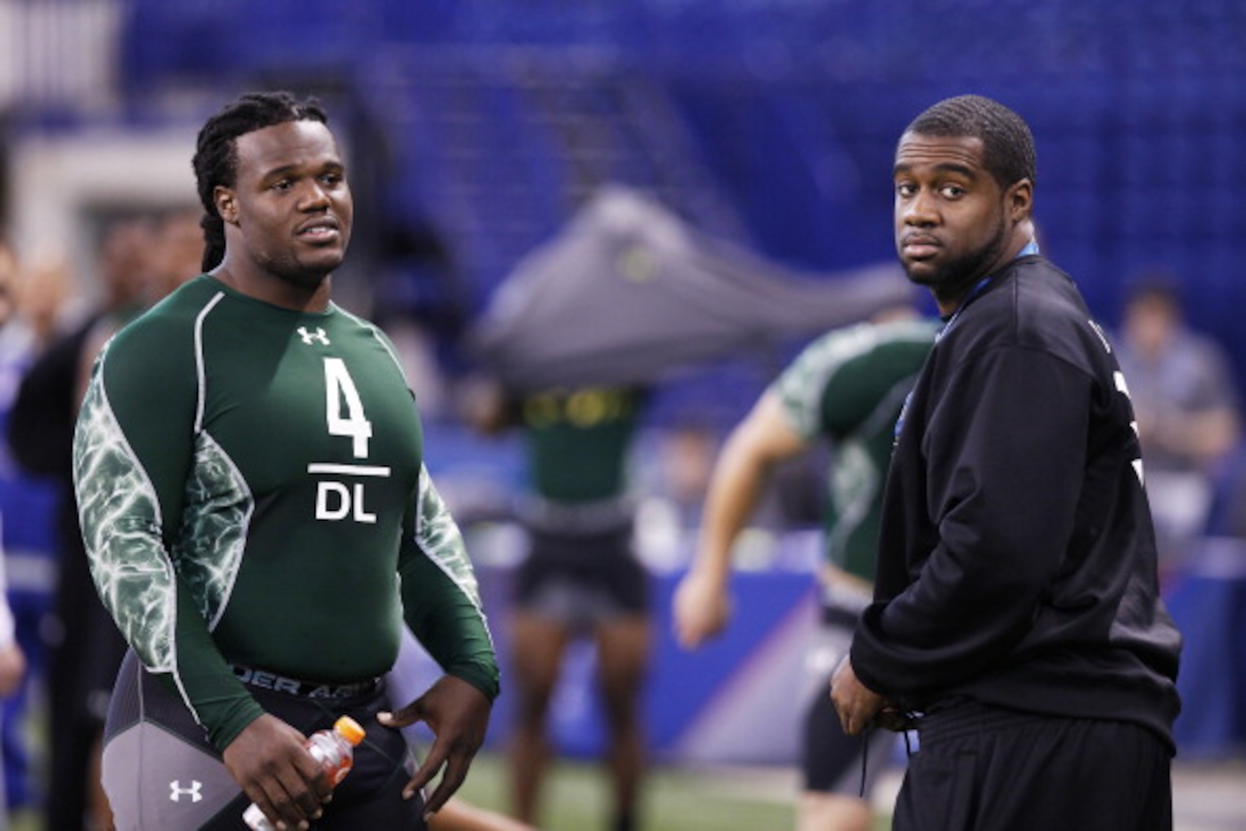 INDIANAPOLIS, IN - FEBRUARY 28: Former North Carolina teammates Marvin Austin (L) and Bruce Carter look on during the 2011 NFL Scouting Combine at Lucas Oil Stadium on February 28, 2011 in Indianapolis, Indiana. (Photo by Joe Robbins/Getty Images) INDIANAPOLIS, IN - FEBRUARY 28: Former North Carolina teammates Marvin Austin (L) and Bruce Carter look on during the 2011 NFL Scouting Combine at Lucas Oil Stadium on February 28, 2011 in Indianapolis, Indiana. (Photo by Joe Robbins/Getty Images)