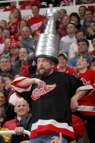 DETROIT - APRIL 16:   Fan Mo Cheese of the Detroit Red Wings cheers in the stands against the Columbus Blue Jackets during Game One of the Western Conference Quarterfinals of the 2009 Stanley Cup Playoffs on April 16, 2009 at Joe Louis Arena in Detroit, M