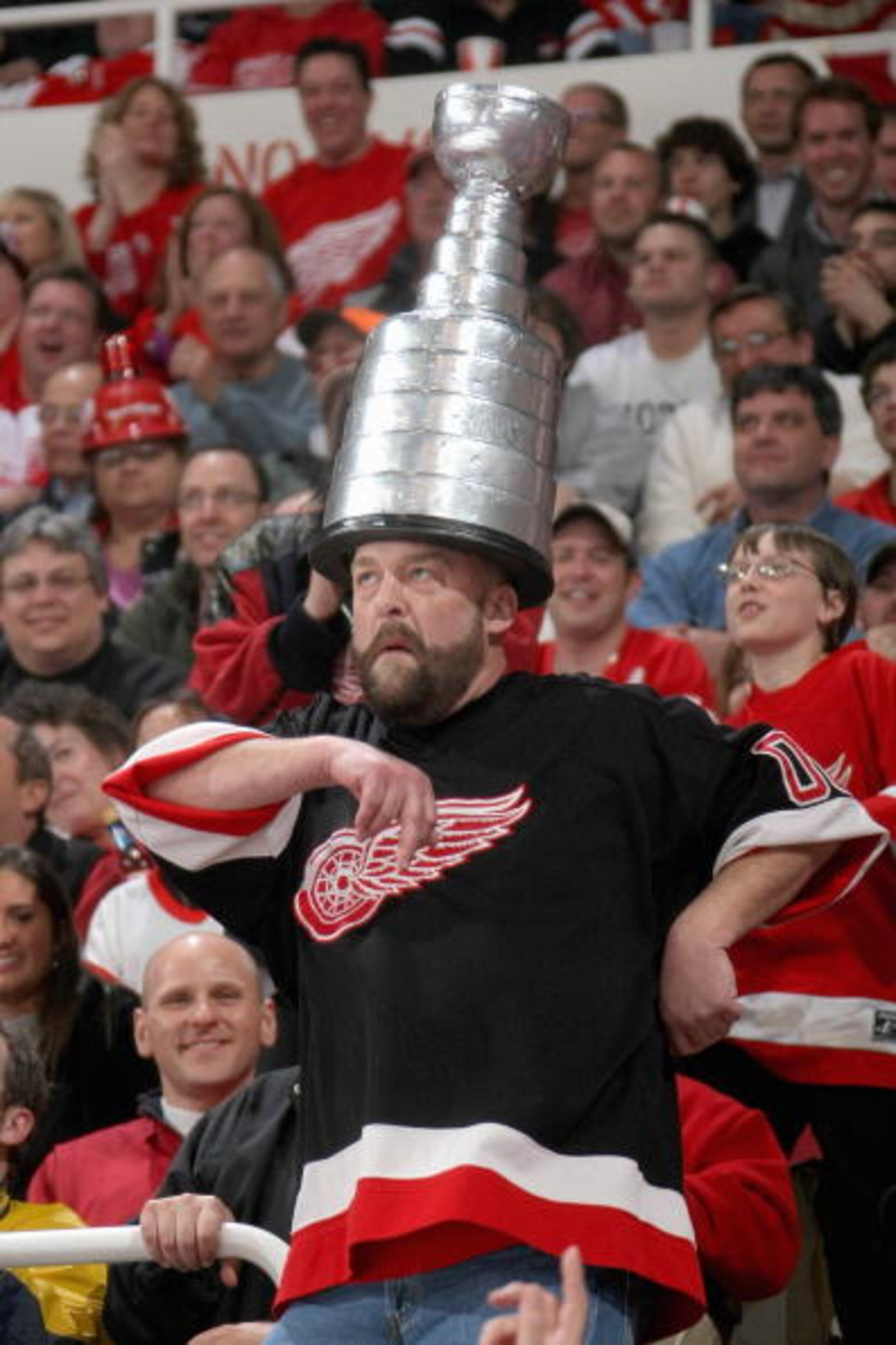DETROIT - APRIL 16:   Fan Mo Cheese of the Detroit Red Wings cheers in the stands against the Columbus Blue Jackets during Game One of the Western Conference Quarterfinals of the 2009 Stanley Cup Playoffs on April 16, 2009 at Joe Louis Arena in Detroit, M