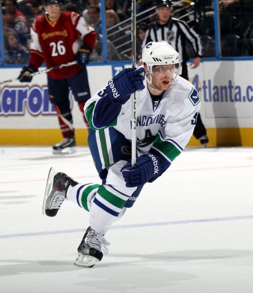 ATLANTA, GA - MARCH 25:  Jannik Hansen #36 of the Vancouver Canucks skates against the Atlanta Thrashers at the Philips Arena on March 25, 2011 in Atlanta, Georgia.  (Photo by Bruce Bennett/Getty Images)