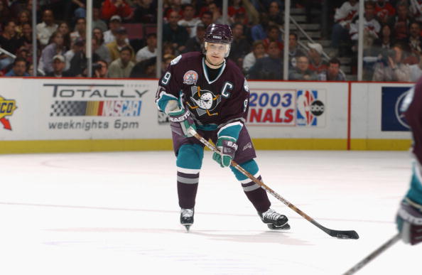 EAST RUTHERFORD, NJ - JUNE 9:  Paul Kariya #9 of the Mighty Ducks of Anaheim looks to pass against the New Jersey Devils in game seven of the 2003 Stanley Cup Finals at Continental Airlines Arena on June 9, 2003 in East Rutherford, New Jersey. The Devils