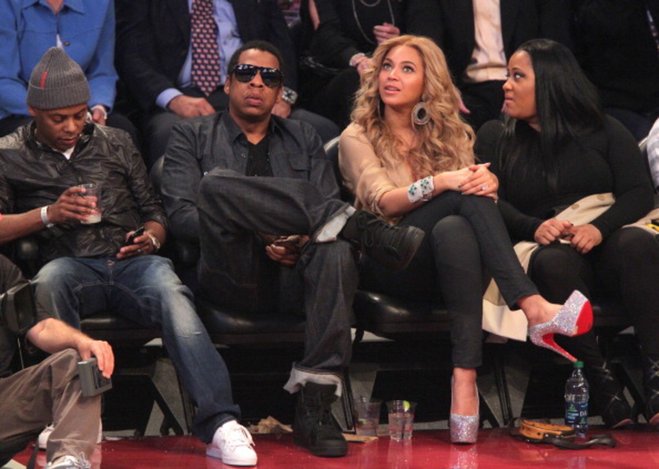 LOS ANGELES, CA - FEBRUARY 20: Jay-Z (L) and singer Beyonce Knowles speak during the 2011 NBA All-Star game at Staples Center on February 20, 2011 in Los Angeles, California. NOTE TO USER: User expressly acknowledges and agrees that, by downloading and o LOS ANGELES, CA - FEBRUARY 20: Jay-Z (L) and singer Beyonce Knowles speak during the 2011 NBA All-Star game at Staples Center on February 20, 2011 in Los Angeles, California. NOTE TO USER: User expressly acknowledges and agrees that, by downloading and o