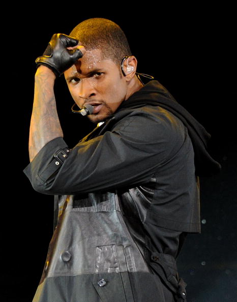 ARLINGTON, TX - FEBRUARY 14:  Singer Usher performs onstage during the NBA All-Star Game held at Cowboys Stadium on February 14, 2010 in Arlington, Texas.  (Photo by Jason Merritt/Getty Images)