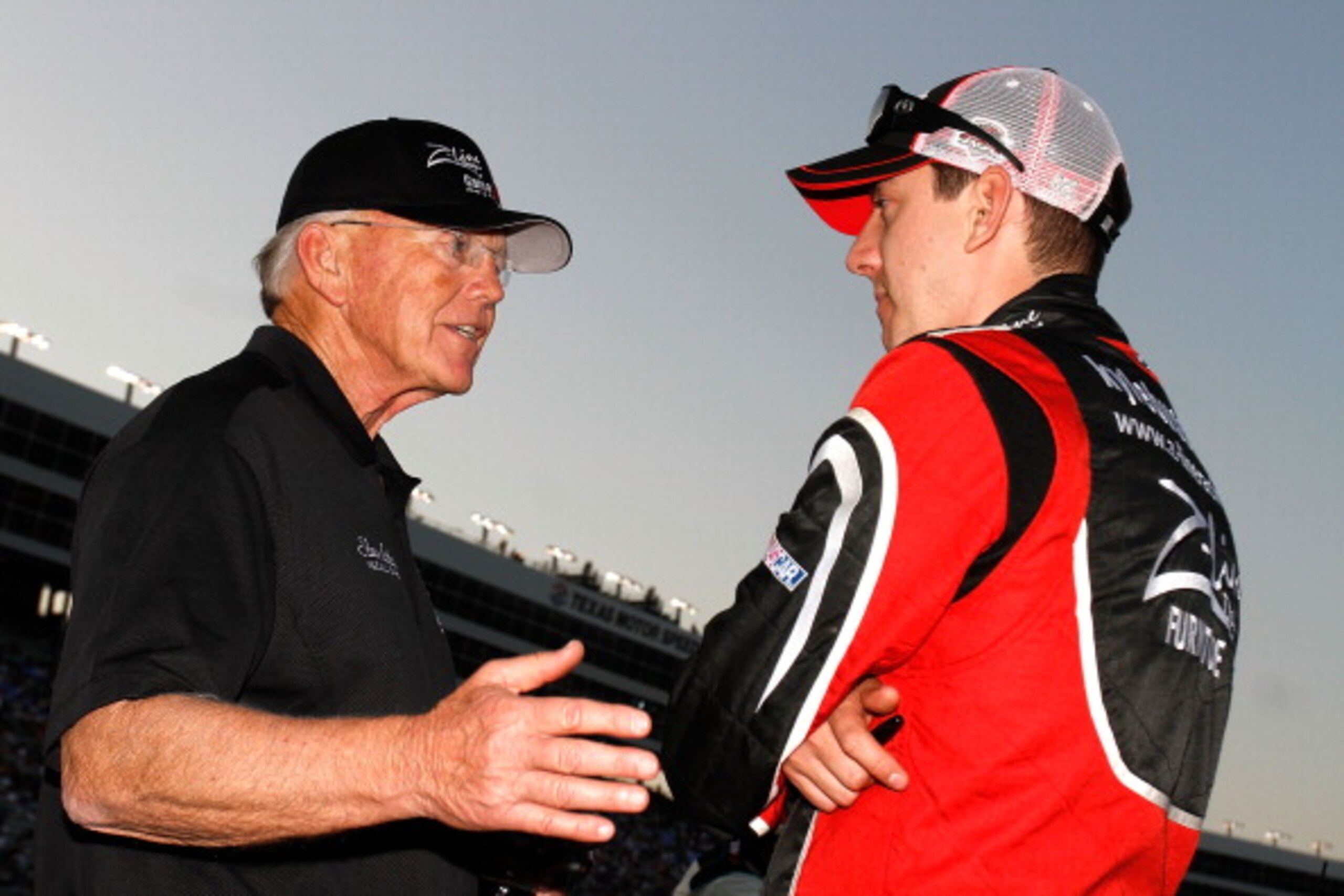 FORT WORTH, TX - APRIL 08: Kyle Busch, driver of the #18 Z-Line Designs Toyota, talks to team owner Joe Gibbs on the grid prior to the NASCAR Nationwide Series O'Reilly Auto Parts 300 at Texas Motor Speedway on April 8, 2011 in Fort Worth, Texas. (Photo FORT WORTH, TX - APRIL 08: Kyle Busch, driver of the #18 Z-Line Designs Toyota, talks to team owner Joe Gibbs on the grid prior to the NASCAR Nationwide Series O'Reilly Auto Parts 300 at Texas Motor Speedway on April 8, 2011 in Fort Worth, Texas. (Photo