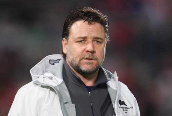 SYDNEY, AUSTRALIA - SEPTEMBER 05:  Russell Crowe watches on during the warm-up before the round 26 NRL match between the St George Illawarra Dragons and the South Sydney Rabbitohs at WIN Jubilee Stadium on September 5, 2010 in Sydney, Australia.  (Photo b