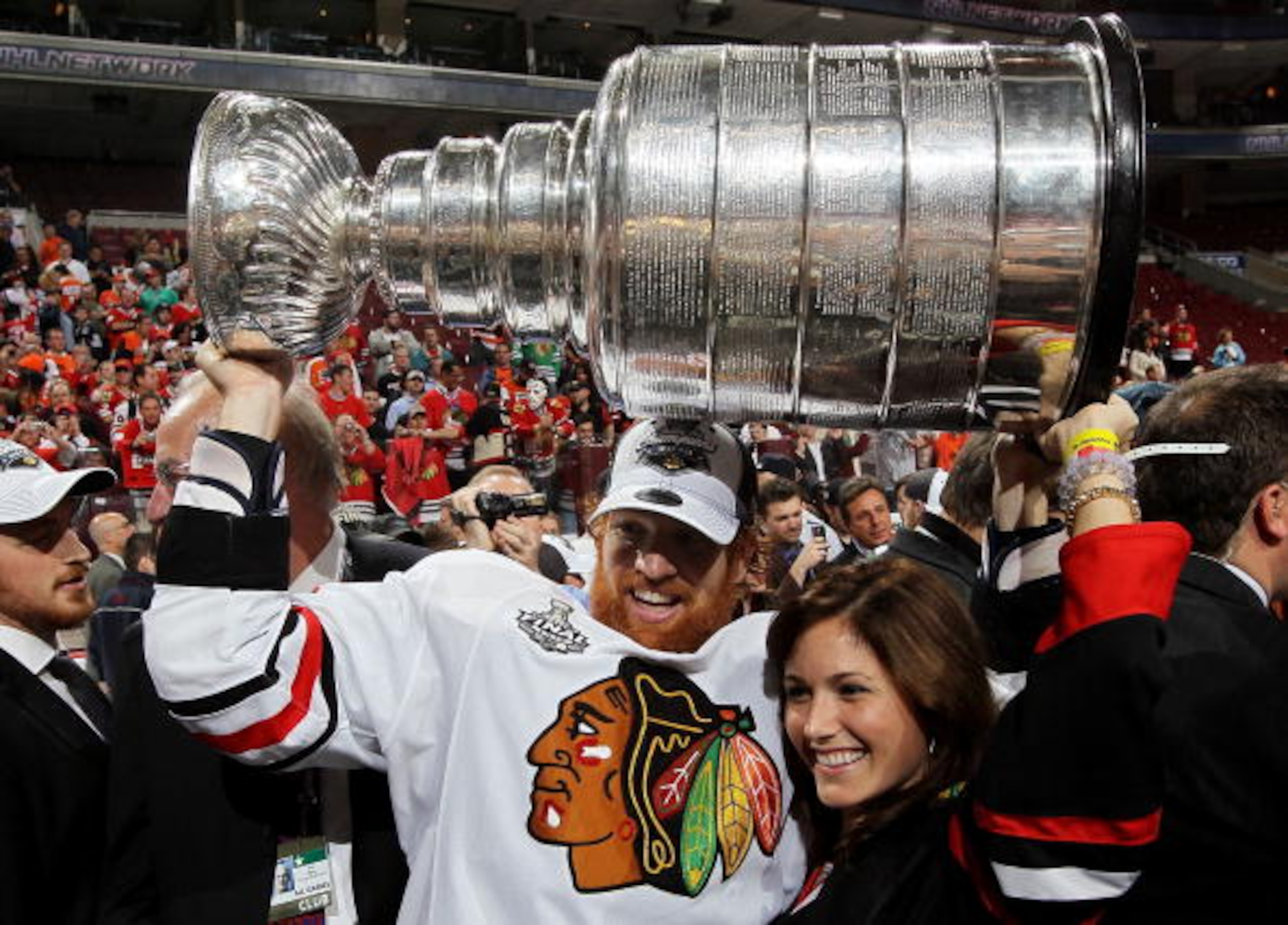 PHILADELPHIA - JUNE 09:  Brian Campbell #51 of the Chicago Blackhawks hoists the Stanley Cup after teammate Patrick Kane scored the game-winning goal in overtime to defeat the Philadelphia Flyers 4-3 and win the Stanley Cup in Game Six of the 2010 NHL Sta