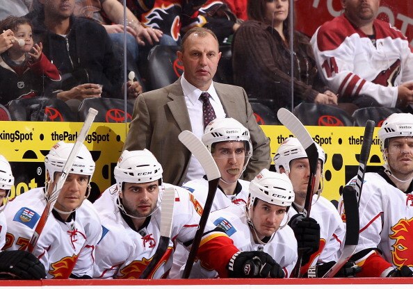 GLENDALE, AZ - MARCH 10:  Head coach Brent Sutter of the Calgary Flames watches from the bench during the NHL game against the Phoenix Coyotes at Jobing.com Arena on March 10, 2011 in Glendale, Arizona.  The Coyotes defeated the Flames 3-0.  (Photo by Chr