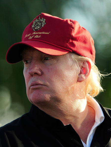 PALM BEACH GARDENS, FL - MARCH 07:  Donald Trump watches the action on the 17th hole during the final round of the Honda Classic at PGA National Resort And Spa on March 7, 2010 in Palm Beach Gardens, Florida.  (Photo by Sam Greenwood/Getty Images)