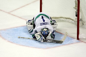 CHICAGO - MAY 07:  Goalie Roberto Luongo #1 of the Vancouver Canucks lies face down on the ice against the Chicago Blackhawks during Game Four of the Western Conference Semifinal Round of the 2009 Stanley Cup Playoffs on May 7, 2009 at the United Center i