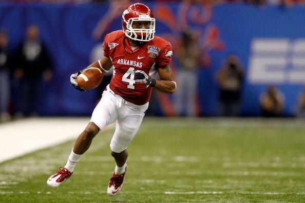 NEW ORLEANS, LA - JANUARY 04:  Jarius Wright #4 of the Arkansas Razorbacks runs after a catch against the Ohio State Buckeyes during the Allstate Sugar Bowl at the Louisiana Superdome on January 4, 2011 in New Orleans, Louisiana.  (Photo by Matthew Stockm
