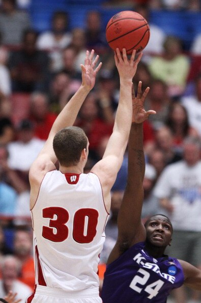 TUCSON, AZ - MARCH 19:  Jon Leuer #30 of the Wisconsin Badgers shoots over Curtis Kelly #24 of the Kansas State Wildcats in the first half during the third round of the 2011 NCAA men's basketball tournament at McKale Center on March 19, 2011 in Tucson, Ar
