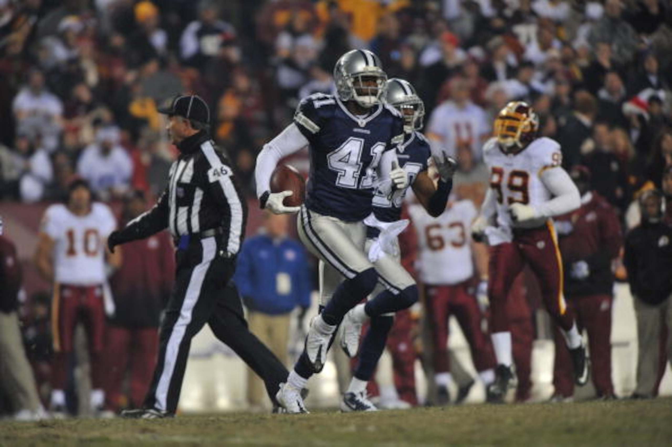 LANDOVER, MD - DECEMBER 27: Terrence Newman #41 of the Dallas Cowboys runs the ball against the Washington Redskins at FedExField on December 27, 2009 in Landover, Maryland. The Cowboys defeated the Redskins 17-0. (Photo by Larry French/Getty Images) LANDOVER, MD - DECEMBER 27: Terrence Newman #41 of the Dallas Cowboys runs the ball against the Washington Redskins at FedExField on December 27, 2009 in Landover, Maryland. The Cowboys defeated the Redskins 17-0. (Photo by Larry French/Getty Images)